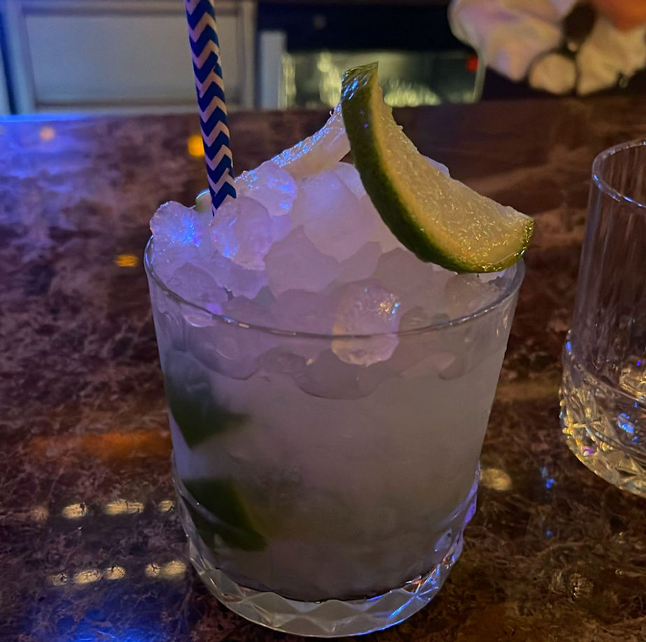 caipirinha cocktail drink in jazz bar in madrid