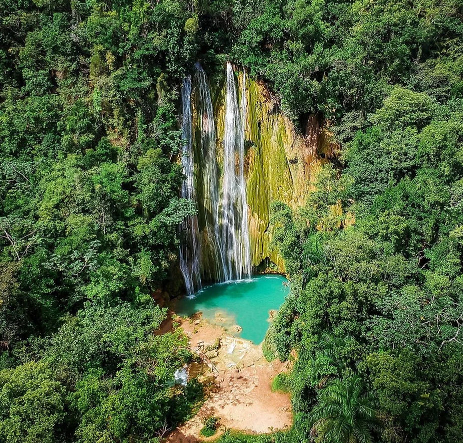 el limon tall waterfall in the middle of lush green mountain