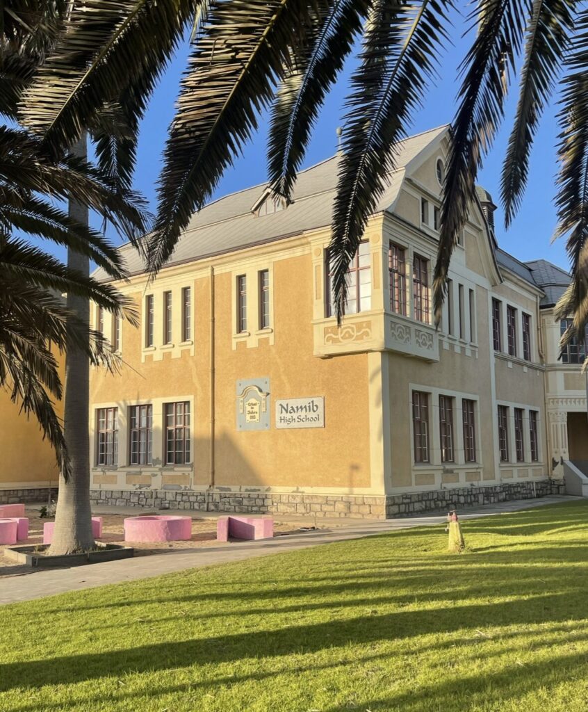 Namib highschool surrounding by palm trees 